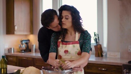 Curly brunette stops cooking to take her dose of tasty dick